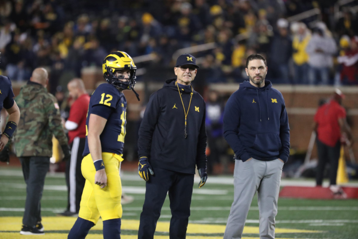 Michigan head coach Jim Harbaugh and ex-co-offensive coordinator Matt Weiss